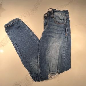 Cello jeans with rips at the knees.  Size 3.